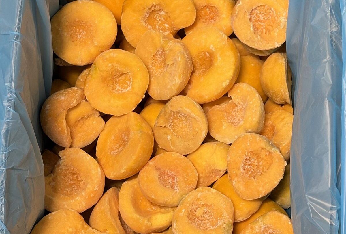 IQF peach halves, individually quick frozen, stone removed
